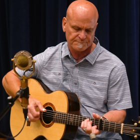 Parry Lamont performing live in WNIJ's Studio A