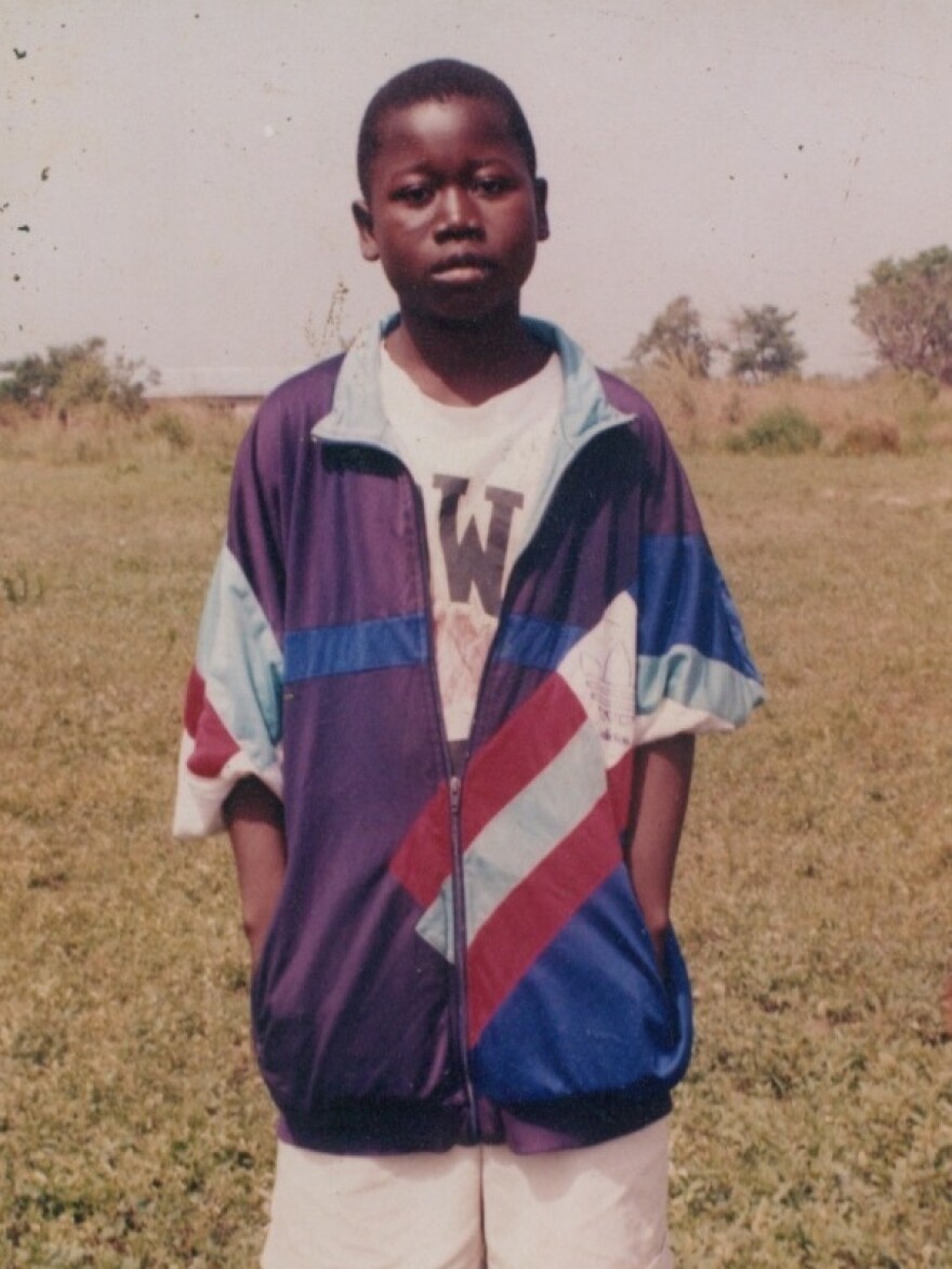 In 2003, Mwinnyaa was a junior high school student. "I didn't have a school uniform, and the shorts I was wearing had two big holes at the back," he remembers. "That is why I wore the oversize jacket, even though the weather was hot, to cover the holes."