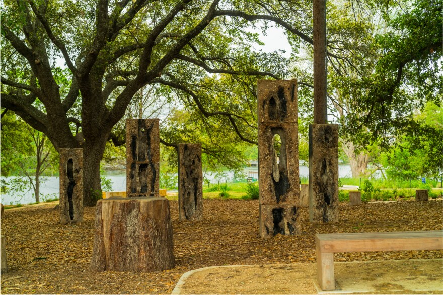TJ Lemanski's Cenotaphs sits at Holly Fishing Pier and is part of the artist's ongoing series where he memorializes fallen tree branches by casting them in concrete and then burning them out of the blocks.