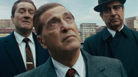 Robert De Niro (from left) stars with Al Pacino and Ray Romano as a mob hit man in Martin Scorsese's <em>The Irishman.</em>