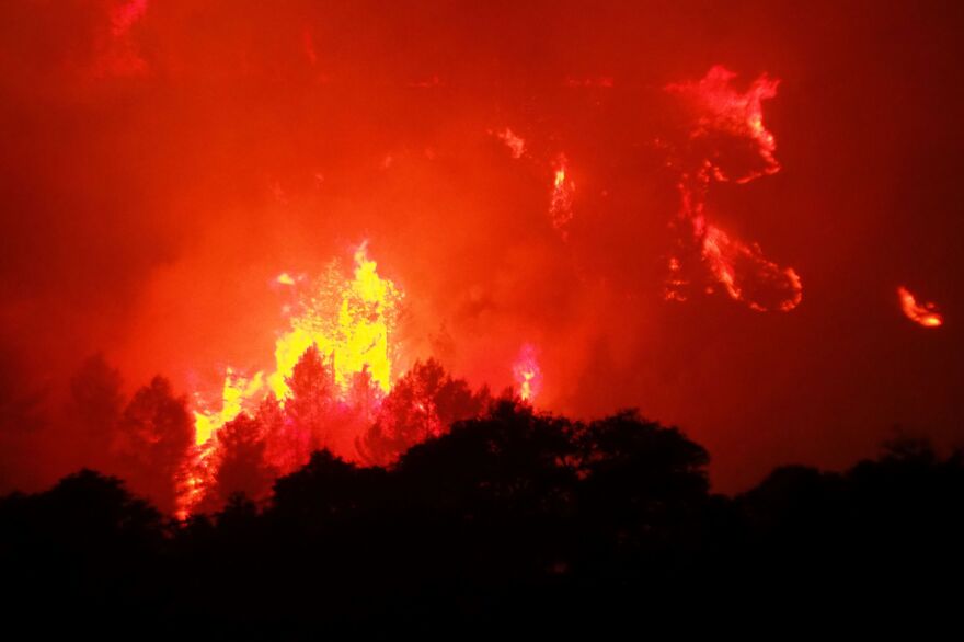 A fire near the village of Monze, in the Aude department of southern France, on Aug. 15. The fire, which broke out the day before following a drought, burned up more than 2,000 acres.
