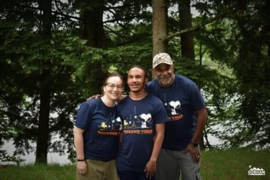 Nivek Dickson with his parents on the first day of summer camp funded by the Office for People with Developmental Disabilities' self-directing program.