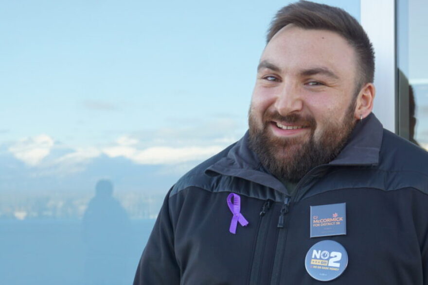 CJ McCormick, a former state House member who is seeking to return to his seat, stands on the patio of the Dena’ina Civic and Convention Center on Oct. 22, 2016, during the Alaska Federation of Natives convention. McCormick, of Bethel, is a Democrat.