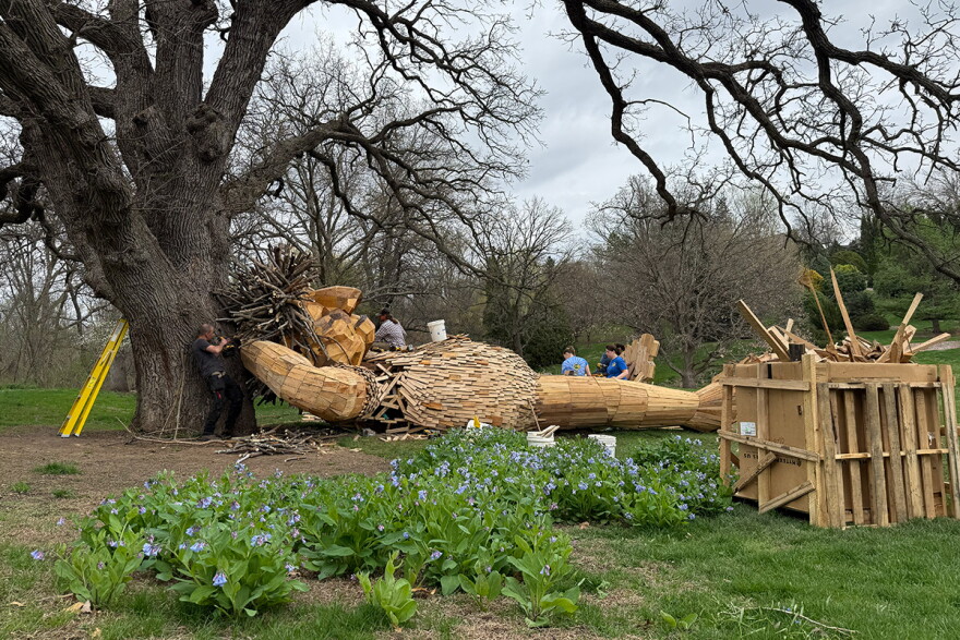 Marvin the troll rests under a tree at the Bickelhaupt Arboretum in Clinton.