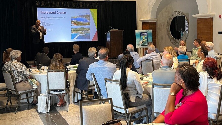 Tourism Commissioner Joseph Boschulte gives presentation to members of the USVI Hotel & Tourism Association at their annual meeting on Thursday.