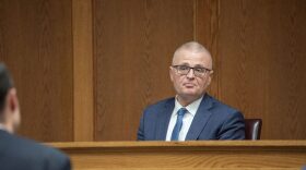 Director of Programs for the Missouri State Treasurer's Office Trent Blair answers questions about the MOScholars program during a trial challenging the constitutionality of Missouri's funding of school vouchers Monday, Nov. 24, 2025 in the Cole County Courthouse.