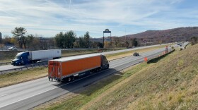 Trucks drive on Interstate 81 at the Hollins exit near Roanoke.