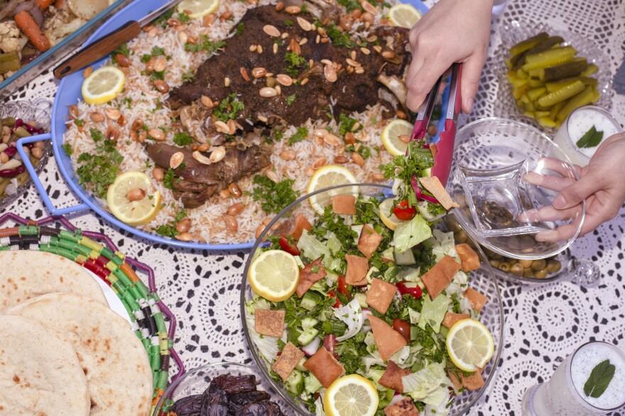 For iftar, the fast-breaking meal after sunset during Ramadan, a mixture of traditional and nontraditional Arabic foods, including lamb served with rice and a side of fattoush, an Arabic salad topped with fried pita bits.