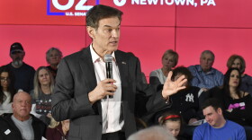 Mehmet Oz, the TV celebrity and heart surgeon who is running for the Republican nomination for U.S. Senate in Pennsylvania, speaks at a town hall-style event at the Newtown Athletic Club, Feb. 20, 2022, in Newtown, Pa.