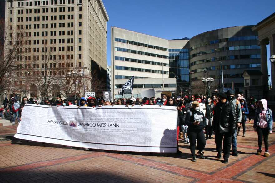 People who have lost family members to police violence rallied in downtown Dayton on Sunday. Over 100 people participated.