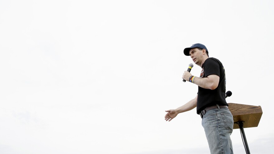 Walker speaks during a June fundraiser for Iowa Sen. Joni Ernst in Boone, Iowa.