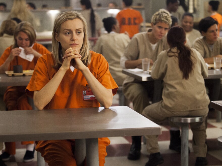 Taylor Schilling plays Piper Chapman in Netflix's <em>Orange Is the New Black</em>, which is based on Piper Kerman's memoir of her year in prison. <a href="http://www.npr.org/2013/08/12/211339427/behind-the-new-black-the-real-pipers-prison-story">Hear an interview with Piper Kerman.</a>