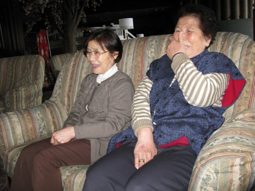Tei Taro (left) and Kiyoko Abe are widows whose houses were swept away in the coastal town of Yamada. Though the government suggests relocating devastated towns elsewhere, the two women say they cannot imagine living anywhere else.