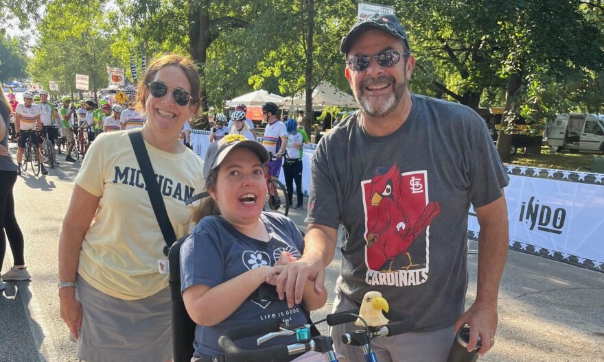 Joyce, Lilly and Larry Opinsky participate in Ride to Unite, an annual 5K bike ride in St. Louis promoting accessible cycling, in August. The family uses a program called self-directed services to pay care staff for Lilly (Photo submitted).