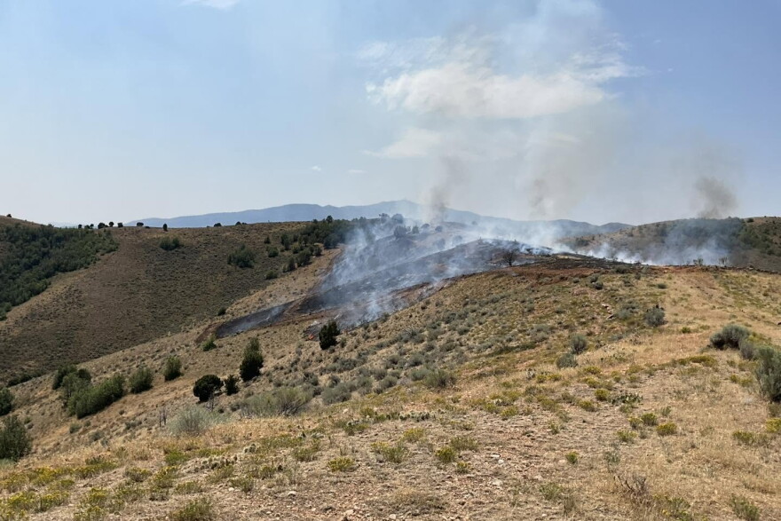 The West Echo Fire burns in the hills west of Echo Reservoir and Interstate 80 in northern Summit County on Aug. 7, 2026.