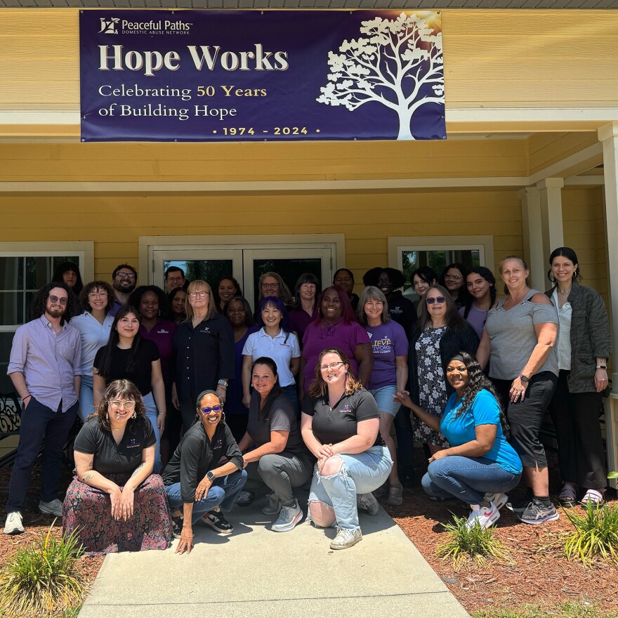 Peaceful Paths staff in front of their office. 