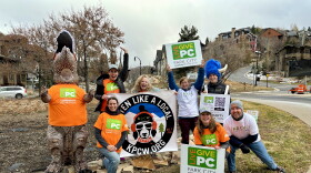 Photo of KPCW staff honk and wave during Live PC Give PC 2024