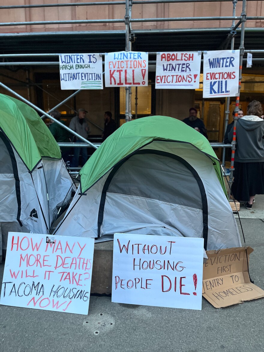 Tenant advocates rallied on Dec. 9 against proposals by the Tacoma City Council to roll back local evictions protections.