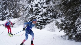 FILE - Campbell Wright, of the United States, right, competes in the men's 4x7.5-kilometer relay biathlon race at the 2026 Winter Olympics in Anterselva, Italy, Feb. 17, 2026.