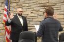 Sean Lowe being sworn into office