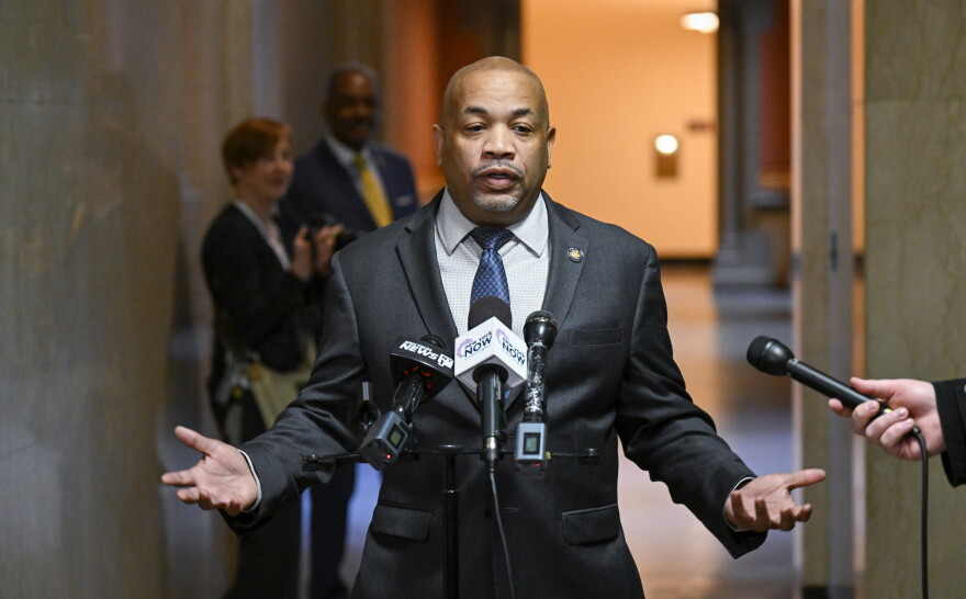 Assembly Speaker Carl Heastie, D-Bronx, talks with reporters about the state budget at the state Capitol, Monday, April 4, 2022, in Albany, N.Y.