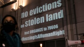 Housing activists and rent strikers participate in a vigil for tenants who they say will not be covered by Gov. Gavin Newsom’s rent relief plan at the Elihu M. Harris, State of California office building in Oakland on Jan. 29, 2021.