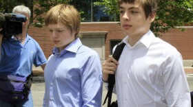 Alexander Vavilov (right), shown in 2010 with older brother Timothy, leave a federal court in Boston after a hearing for their parents, who worked for the Russian foreign intelligence service starting in the 1980s.