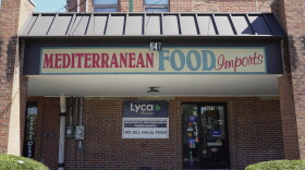 A storefront with the name, 'Mediterranean Food Imports'