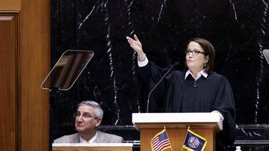 Indiana Supreme Court Chief Justice Loretta Rush points to the gallery during the 2017 State of the Judiciary address.
