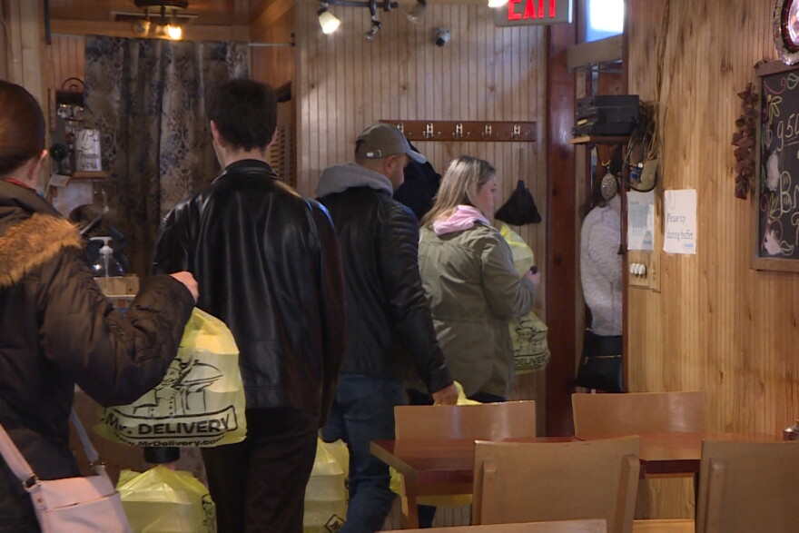 Volunteers heading out with food for those in need.