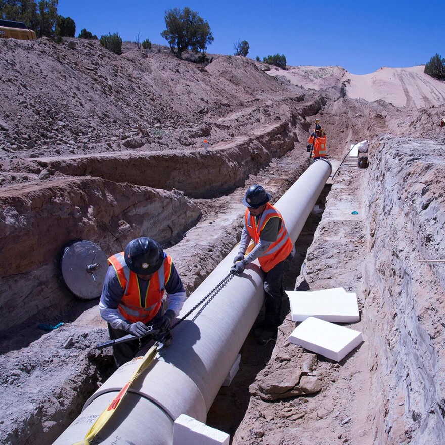 Construction workers in an undated 2020 photo, working on the Navajo-Gallup Water Supply Project. The project aims to pipe clean water to the eastern Navajo Nation, the Jicarilla Apache Nation and the City of Gallup from the San Juan river.