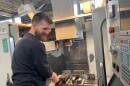  Adam Stark, a Cleveland State University engineering graduate, is happier working on the factory floor of Bowden Manufacturing in Willoughby than just designing parts on a computer screen in a cubicle.
