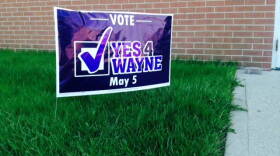 A sign supporting the referendum for Wayne Township schools outside the former Westlake Church of Christ near I-465, where the political action committee that supports the measure is based.