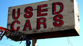  a used car sign