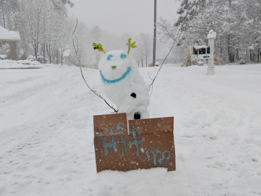 A snowman greets neighbors in North Durham on January 17, 2018.