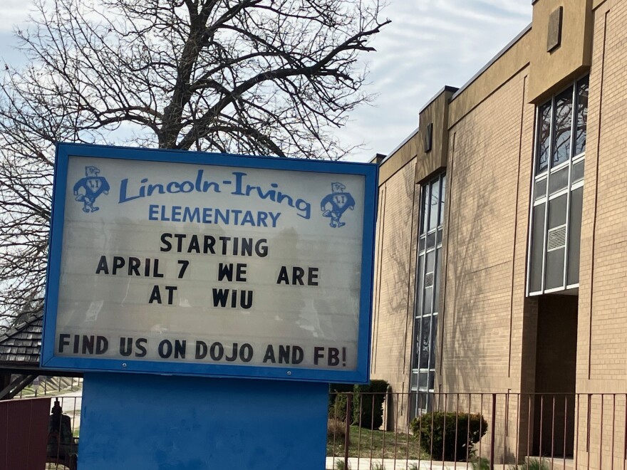 The sign outside Lincoln-Irving in Moline notes the school will start at Western Illinois University April 7, for the duration of the 16-month, $33-million construction project.