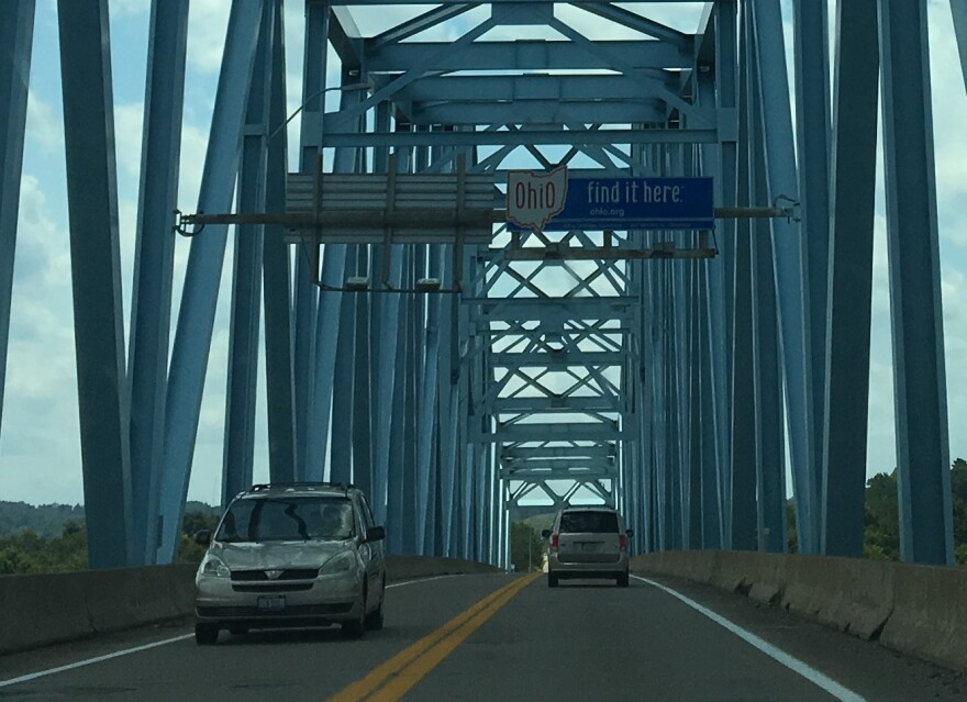 The "Ohio Find It Here" sign welcomes people on the William S. Ritchie Jr. Bridge, also known as the Ravenswood Bridge, on the border with West Virginia. [Karen Kasler]