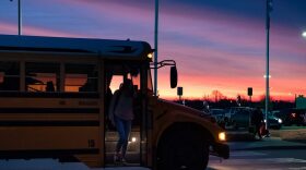 Yukon High School students are dropped off in front of the school as the sun rises, around 7:15 a.m. Studies show that high school students typically perform better when school starts at 8:30 a.m., allowing them to get more sleep.