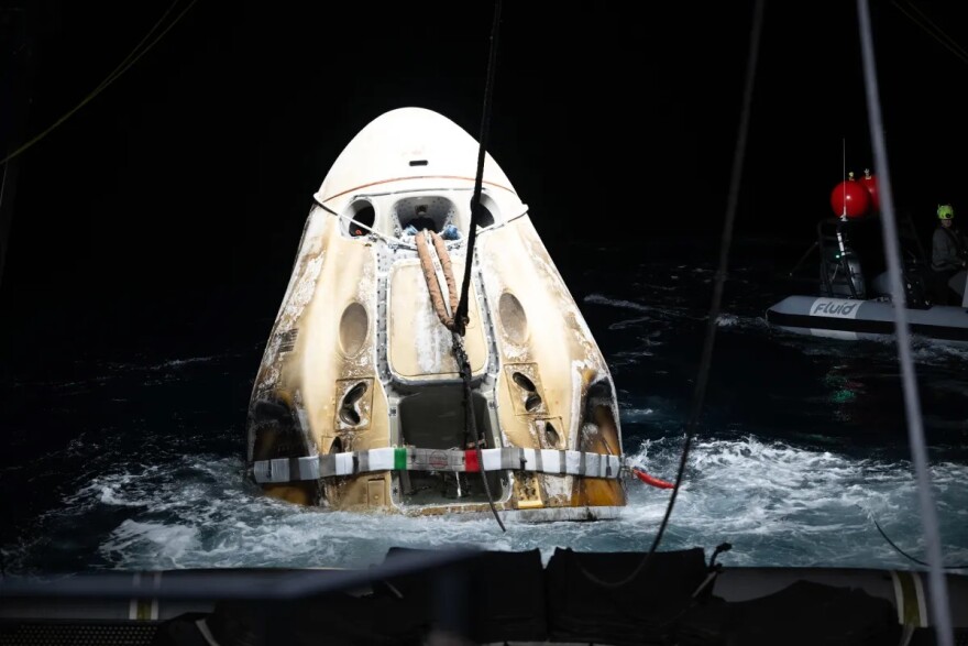 The Crew Dragon spacecraft Endeavour is brought on board a recovery ship after its Sept. 4 splashdown off the Florida coast.