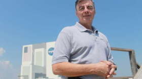Space Day 2015 Chair Andy Allen stands in front of the Vehicle Assembly Building at Kennedy Space Center. Photo: Amy Green, WMFE