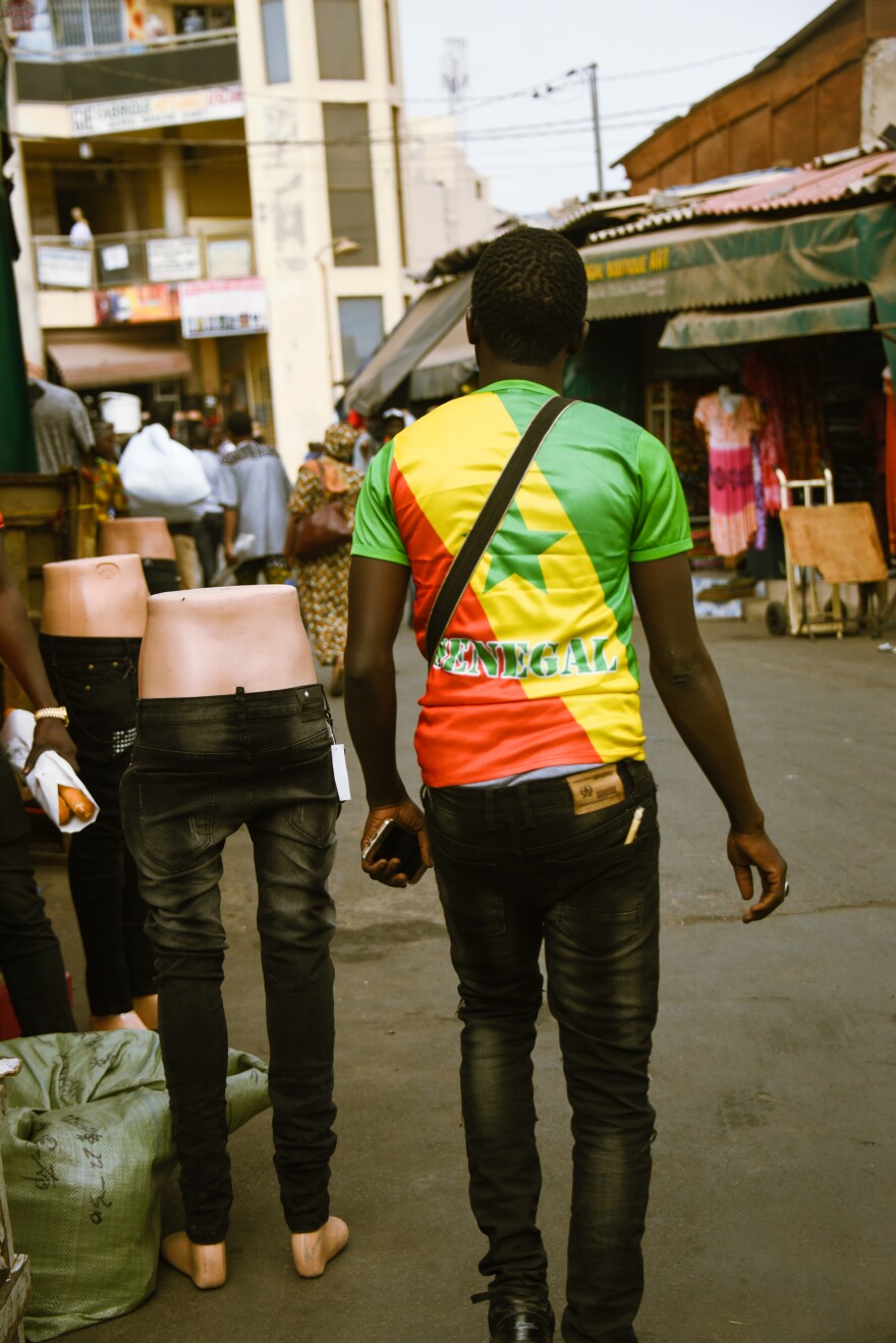 The shirt makes the man: a scene from Dakar's Sandaga Market.