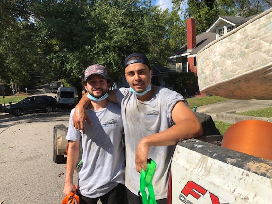 Joshua Barnhill, left, started Haul'N It LLC just over a year ago. Business was so busy, he hired friend Joshua Daley to help.