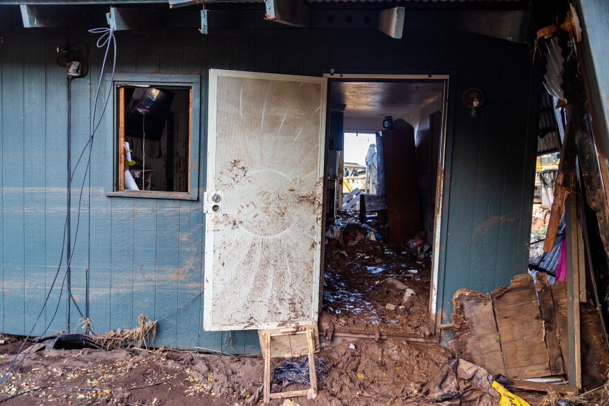 The doorway to one of the Otake Camp residences that was flooded and filled with mud. (March 25, 2026)