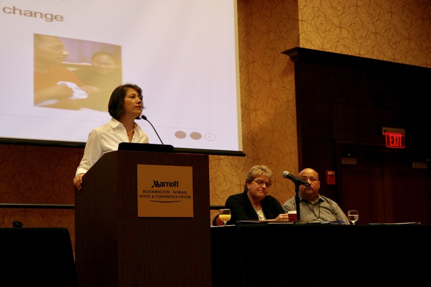 Diana Rauner speaks at podium