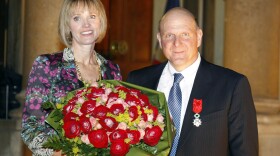 Former Microsoft CEO, Steve Ballmer, right, and his wife Connie pose on the steps of the Elysee Palace after he was awarded Knight of the Legion of Honor by France's President Nicolas Sarkozy on Feb. 16, 2011. 