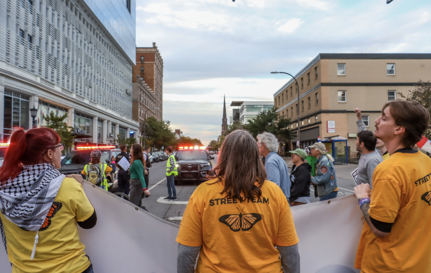 Protesters occupy the intersection of Delaware Avenue and Chippewa Street on Sept. 26, 2026, during an Evict ICE demonstration in downtown Buffalo.