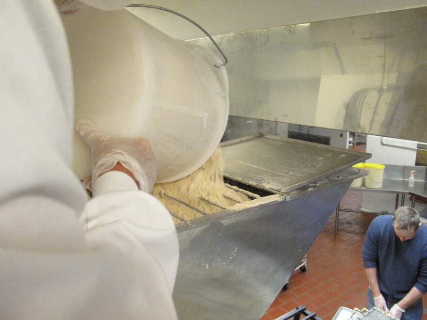 A dry mix of soy and pea powder, carrot fiber and gluten-free flour is heated, cooled and extruded through a machine, producing a fake meat that mimics chicken.