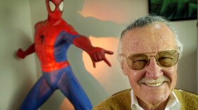 Stan Lee, 79, creator of comic-book franchises such as "Spider-Man," "The Incredible Hulk" and "X-Men," smiles during a photo session April 16, 2002, in his office in Santa Monica, Calif. (AP Photo/Reed Saxon)