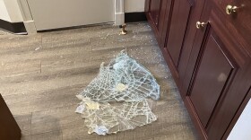 Broken glass in the office of Rep. Richard Neal