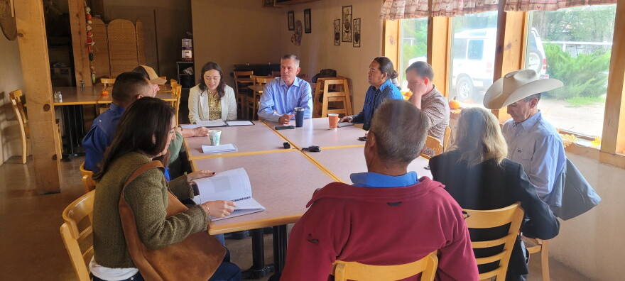 Senator Martin Heinrich sits with members of New Mexico's Agricultural community at Wagner Farm in Corrales on Tuesday.